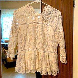 Fully lined lace peplum top